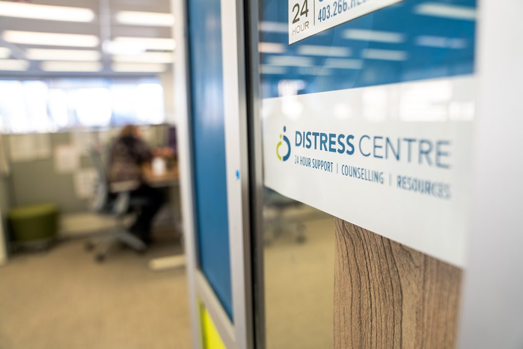 Photo of Distress Centre Calgary's logo in their 24-hour contact centre.